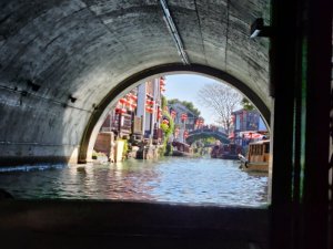 Under a stone bridge in the Great Canal of China